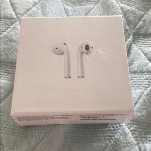 New in box Apple AirPods with wireless charging